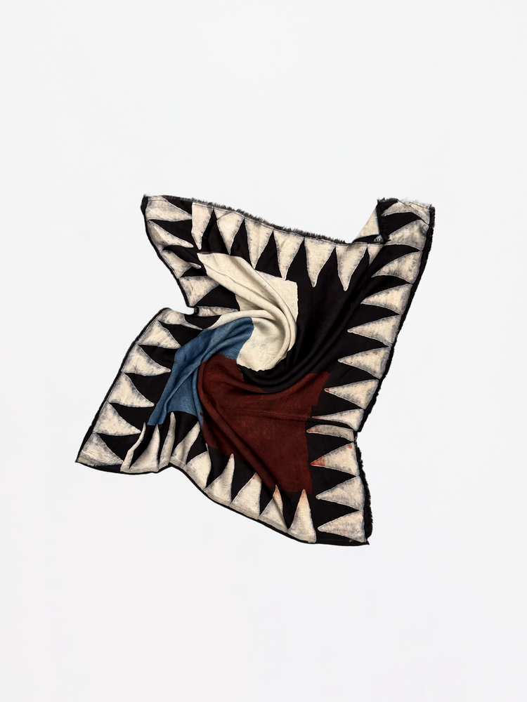 Decorative pillow with geometric pattern on a white background